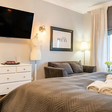Pod Zegarem Apartamento Mikołajki